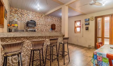 Casa com 5 quartos à venda na Rua Delmar Kuhn, 75, Hípica, Porto Alegre, 135 m2 por R$ 360.000