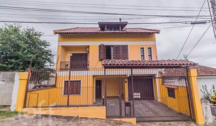 Casa com 4 quartos à venda na Travessa Clemêncio Wallau, 24, Coronel Aparício Borges, Porto Alegre, 484 m2 por R$ 780.000