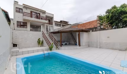 Casa com 4 quartos à venda na Rua Paul Harris, 130, Jardim Itu Sabará, Porto Alegre, 245 m2 por R$ 1.450.000