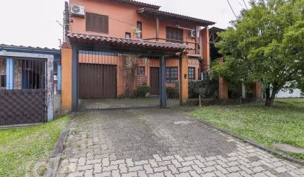 Casa com 3 quartos à venda na Rua Tomé Antônio de Souza, 267, Campo Novo, Porto Alegre, 150 m2 por R$ 497.000