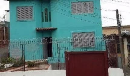 Casa com 4 quartos à venda na Avenida Delmar Rocha Barbosa, 729, Rubem Berta, Porto Alegre, 220 m2 por R$ 530.000