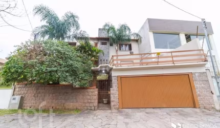 Casa com 4 quartos à venda na Avenida da Serraria, 742, Espírito Santo, Porto Alegre, 284 m2 por R$ 900.000