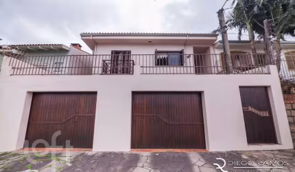 Casa com 3 quartos à venda na Rua Arnaldo Ballve, 695, Jardim Itu Sabará, Porto Alegre, 198 m2 por R$ 515.000