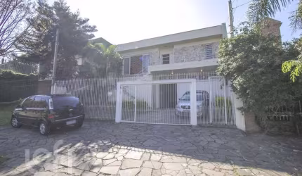 Casa com 4 quartos à venda na Rua Professor Ulisses Cabral, 341, Chácara das Pedras, Porto Alegre, 254 m2 por R$ 1.190.000