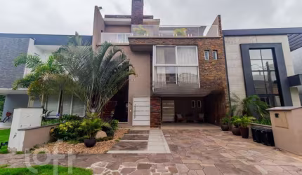 Casa em condomínio fechado com 3 quartos à venda na Rua Ivo Walter Kern, 599, Hípica, Porto Alegre, 291 m2 por R$ 1.290.000