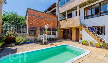 Casa com 3 quartos à venda na Rua Vinte e Seis de Dezembro, 648, São José, Porto Alegre, 186 m2 por R$ 550.000