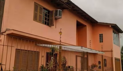 Casa com 4 quartos à venda na Beco Maria Alice, 40, Restinga, Porto Alegre, 300 m2 por R$ 477.000