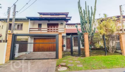 Casa com 3 quartos à venda na Rua Henrique Scliar, 284, Jardim Itu Sabará, Porto Alegre, 380 m2 por R$ 1.950.000