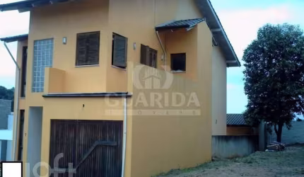 Casa em condomínio fechado com 3 quartos à venda na Beco Juca Batista, 2705, Espírito Santo, Porto Alegre, 190 m2 por R$ 550.000