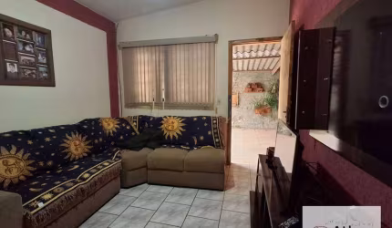 CASA COM TERRENO DE 400M2