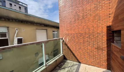 Casa triplex com 3 dormitórios à venda, 158 m² por R$ 780.000 - Gonzaga - Santos/SP