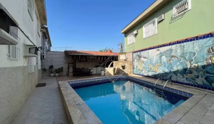 Casa com 3 dormitórios à venda por R$ 1.100.000,00 - Macuco - Santos/SP