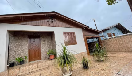 Casa com quatro dormitórios localizado no bairro Juscelino Kubitscheck na cidade