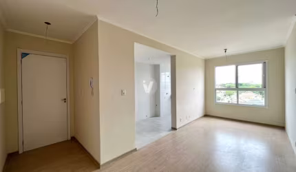 Apartamento de 2 dormitórios e com vaga de garagem.