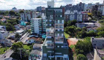 Apartamento 2 dormitórios com suíte e 2 vagas de garagem.