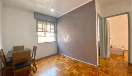 Apartamento central 2 dormitórios com vaga de garagem