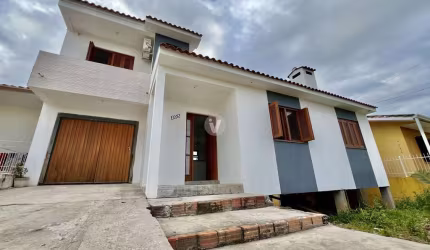 Ampla casa no Novo Horizonte com 3 dormitórios e 2 vagas de garagem!