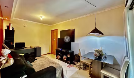 Apartamento central 2 dormitórios com garagem!