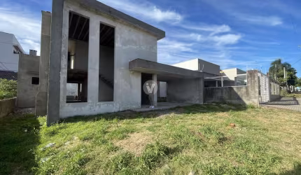 Casa alto padrão com 03 suítes e pátio no bairro Novo Horizonte