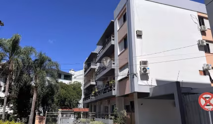Apartamento com 3 dormitórios, 2 vagas e sacada no Centro