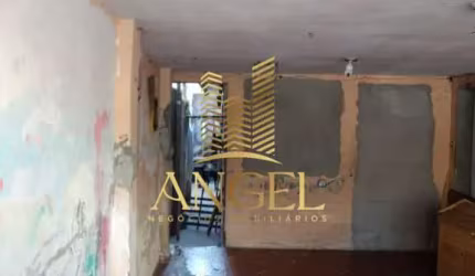 TERRENO COM 4 CASAS - AGUA RASA