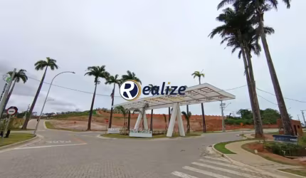 Terreno no condomínio Alphaville á venda no Jardim Boa Vista, Guarapari-ES - Realize Negócios Imobiliários.