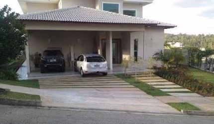 BELÍSSIMA E CONFORTÁVEL CASA À VENDA NO COND. VILLAGIO PARADISO - A/C 406 m², Alto padrão, 04 dormitórios, (02 suítes - 01 máster com hidro e closet)