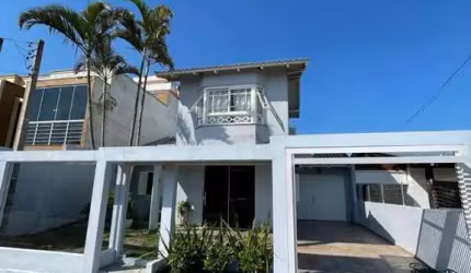 Casa para Venda em Torres, Igra Sul, 3 dormitórios, 1 suíte, 2 banheiros, 3 vagas