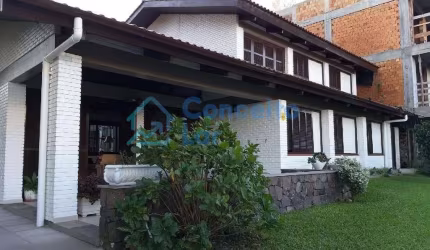 Casa para Venda em Torres, Praia Grande, 5 dormitórios, 1 suíte, 4 banheiros, 1 vaga