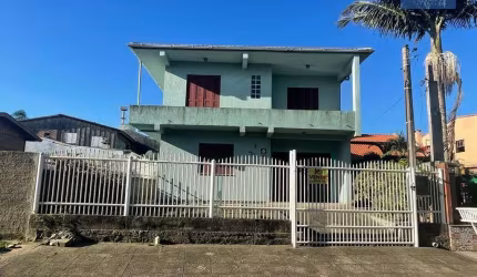 Sobrado 4 dormitórios em Capão da Canoa