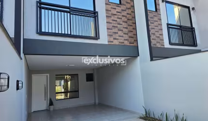 Sobrado Geminado a venda bairro Saguaçu por R$715.000,00