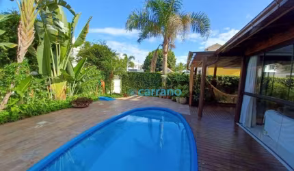 Casa com 3 suítes à venda, 242 m² por R$ 3.990.000 - Jurerê Internacional - Florianópolis/SC