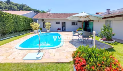 Casa com 3 dormitórios à venda, e uma suíte, 154 m² por R$ 1.050.000 - Velha Central - Blumenau/SC