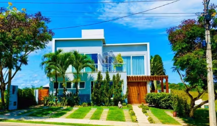 Casa em condomínio decorada e mobiliada 5 quartos sendo 4 suítes 380m2 em Alphaville Litoral Norte II