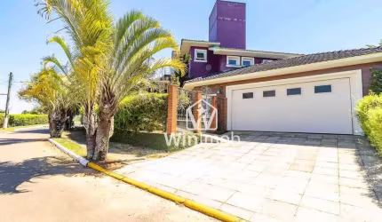 Casa à venda, 350 m² por R$ 1.800.000,00 - Condomínio Cantegril - Viamão/RS