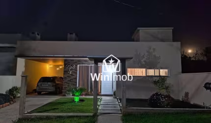 Casa com 3 dormitórios à venda, 138 m² por R$ 699.000,00 - Condomínio Cantegril - Viamão/RS