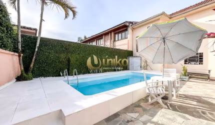 Linda Casa Térrea com Edícula e Piscina