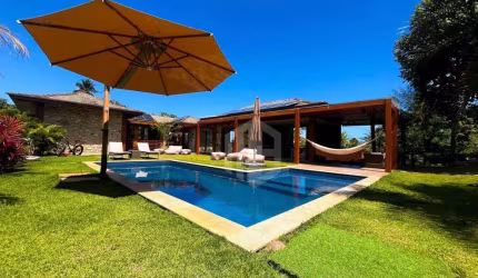 Casa de Luxo à Venda no Enseada do Castelo – Praia do Forte | 5 Suítes | Porteira Fechada | Piscina e Espaço Gourmet!