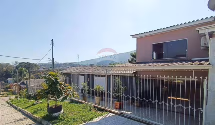 Casa de 7 dormitórios, com 2 vagas de garagem no bairro Santa Isabel em Viamão!
