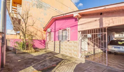 Terreno 10x30  com 2 casas no pátio à venda,  por R$425.000 - Bairro Monte Carlo- Cachoeirinha/RS