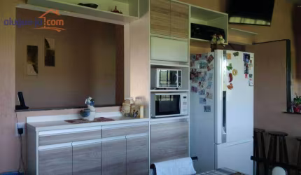 Casa à Venda em condomínio fechado no bairro Vila das Flores com 2 quartos e 73m²