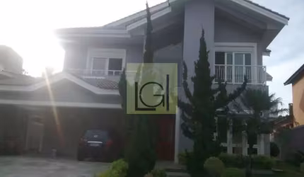 Imóvel de luxo em condomínio exclusivo de Barueri-SP: casa com 4 suítes, 3 salas e 455m² de área