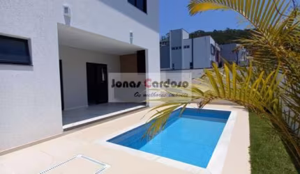 Sobrado rico em planejados no condomínio Bella Citta, área gourmet com piscina, suíte com closet pronto, por R$: 1.700.000 em Mogi das Cruzes.