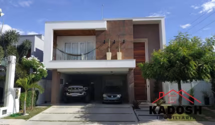 Casa de luxo em condomínio: 4 quartos, 3 suítes, 2 salas, 4 banheiros, 3 vagas de garagem, 397 m² em Feira de Santana-BA