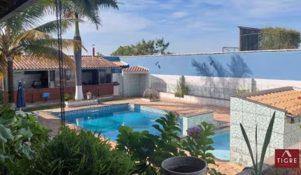 Casa em condomínio fechado com 3 quartos à venda na Rua Rio de Janeiro, 7, Jardim das Palmeiras, Capim Branco por R$ 670.000