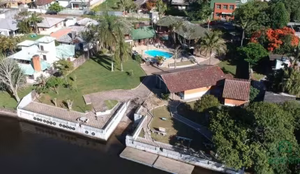 Espetacular casa de cinema, Beira do Rio em Torres - CA2375