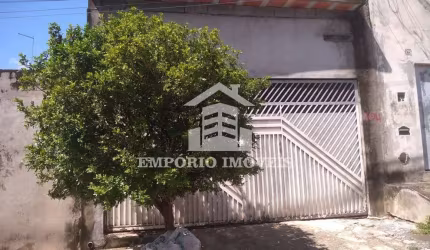 Vende-se uma casa .