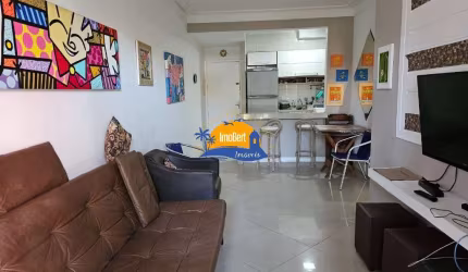 Apartamento à venda  na quadra da praia no Centro de Bertioga-SP: 2 quartos, 1 suíte, 2 salas, 2 banheiros e 70m² de área. Aproveite!