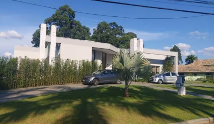 CASA  térrea localizado no Alphaville 1 / 4 suítes / ótima localização