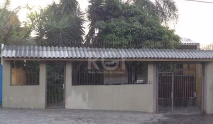 Casa averbada,com 212 m edificados ,3 dormitórios um suite com hidro ,living ,estar com sacada,lavabo,cozinha montada, lavanderia,área de serviço com dependência e banheiro auxiliar,posto de luz e mai